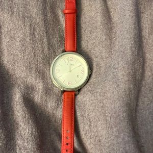 Silver watch with pink leather band